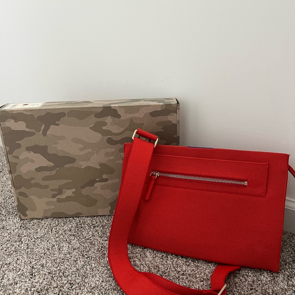 Rothy’s double zip crossbody in Bright Poppy